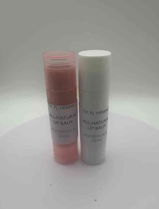 Two tubes of all-natural lip balm, one pink and one white, with simple labels against a neutral background.